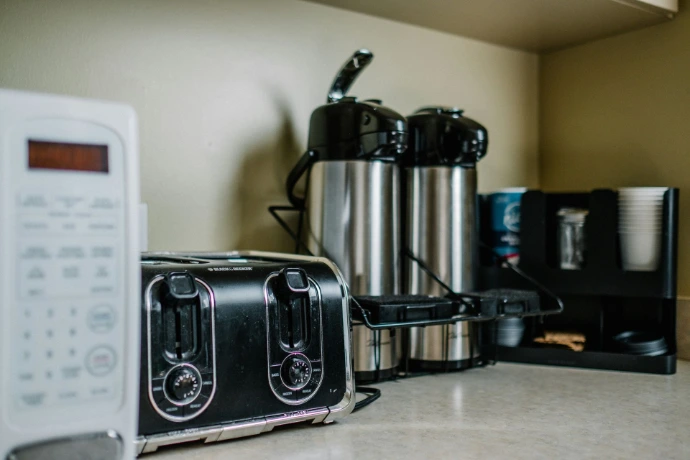 Portable electrical appliances including a toaster and microwave
